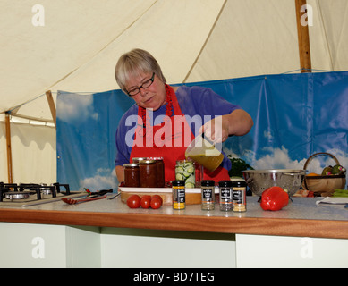 A pickling demonstration by Rosemary Moon at the Chilli Fiesta, West Dean Gardens, West Sussex, England, UK. Stock Photo