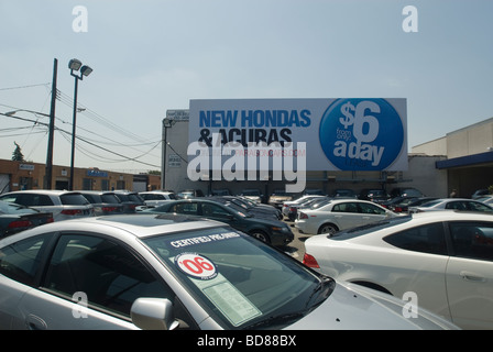 Used and pre owned automobiles are offered for sale at car dealers on Northern Boulevard in the borough of Queens in New York Stock Photo
