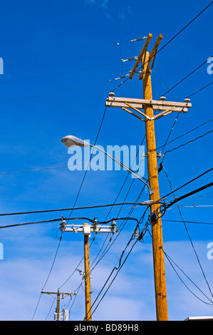industrial telephone and power poles with wires Stock Photo