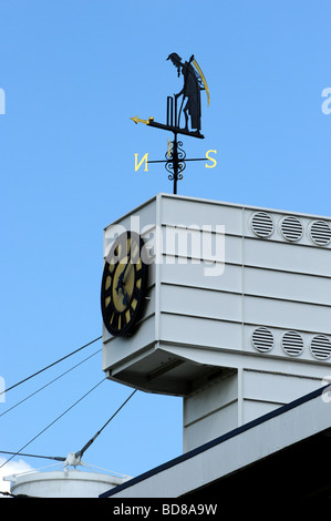 The weather vane and clock inside lord's cricket ground called old father time Stock Photo