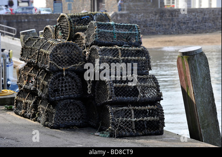 Lobster pots on the quayside at Ilfracombe harbour on the north devon coast, UK Stock Photo