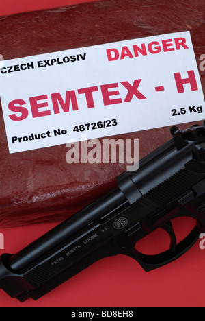BERETTA HANDGUN WITH PACK OF SEMTEX-H PLASTIC EXPLOSIVE Stock Photo - Alamy