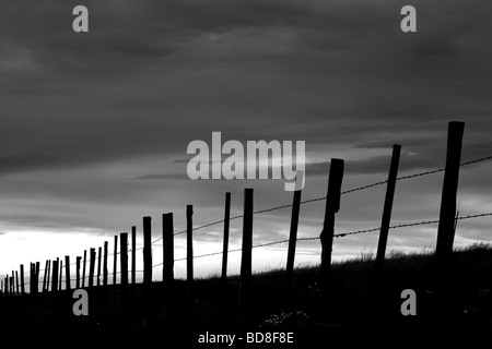 Fence in Wallowa County Oregon at sunset Stock Photo
