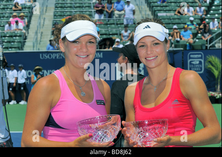 Agnieszka Radwanska of Poland & Maria Kirilenko of Russia hold runners-up trophies at the 2009 Los Angeles Tennis Championships. Stock Photo