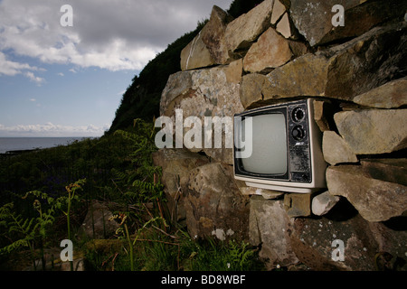 An unusual wall sculpture on the Holy Island, off Lamlash, Arran, Scotland. Stock Photo