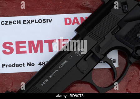 BERETTA HANDGUN WITH PACK OF SEMTEX-H PLASTIC EXPLOSIVE Stock Photo - Alamy