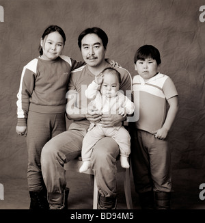 Black white studio portrait of Inuit family in a photography studio in Iqaluit Nunavut Canada Stock Photo