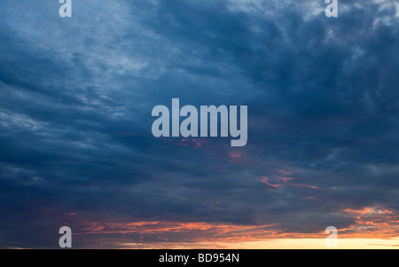 Dusk twilight sky with stratocumulus clouds at sunset Stock Photo