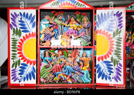 Miniature painted wooden nativity scene on sale in tourist handicraft market, La Paz, Bolivia Stock Photo