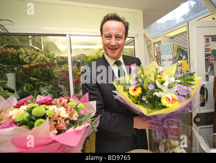 David Cameron, as leader of the opposition, receives flowers, for his wife Samantha, from the Friend's of St Mary's hospital in Paddington. Stock Photo