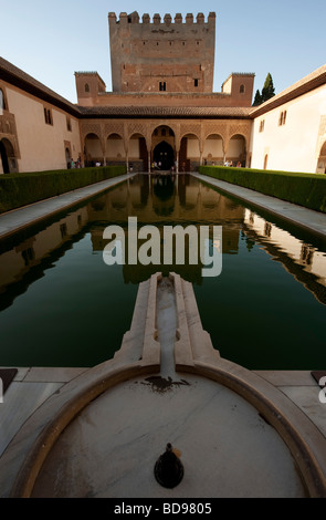 View of the Court of the Myrtles with Comares Tower on the back. Alhambra Palace in Granada, Spain Stock Photo