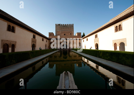 View of the Court of the Myrtles with Comares Tower on the back. Alhambra Palace in Granada, Spain Stock Photo