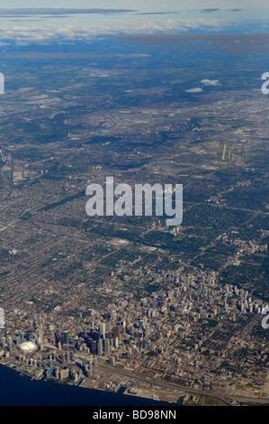 Aerial view of North York and downtown Toronto with financial district highrise towers, CN tower and Roger's Centre skydome out to GTA suburbs Stock Photo