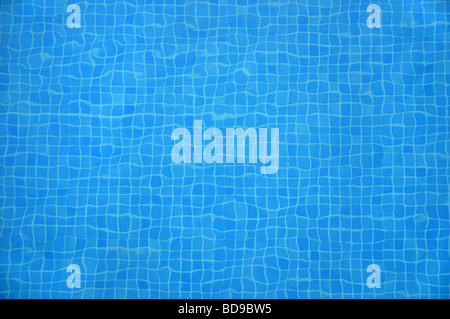 blue mosaic tiles at the bottom of a swimming pool Stock Photo