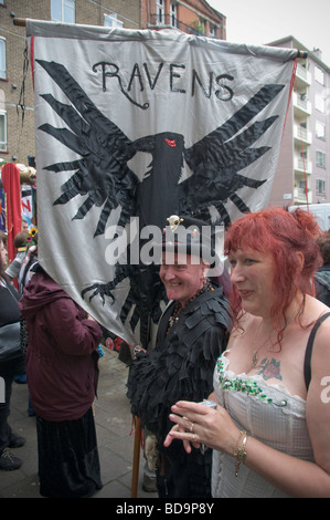 Pagans hold a Pagan Pride Parade in London as a part of their Beltane Bash celebrations. Ravens banner Stock Photo