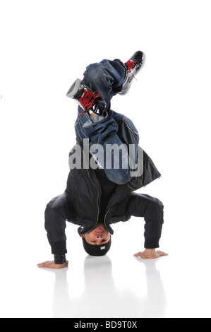 African American hip hop dancer performing headstand Stock Photo