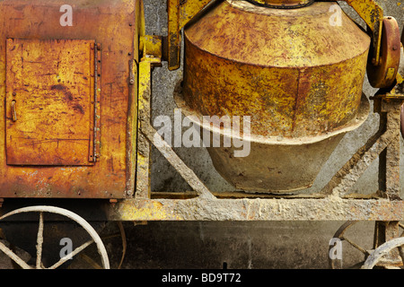 a cropped, close up of an old cement mixer Stock Photo