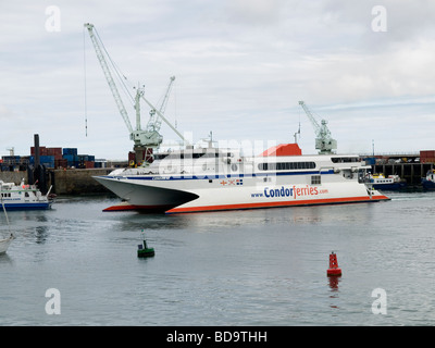 Catamaran Ferry Condor 10 arriving at St Peter Port harbour Guernsey Channel Islands Stock Photo