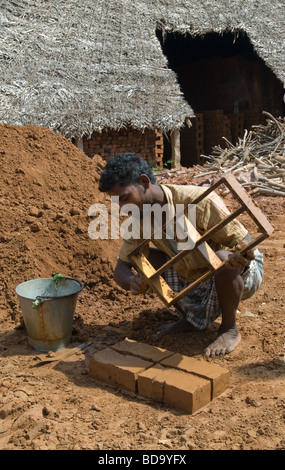 Man making bricks in Maharashtra, India Stock Photo