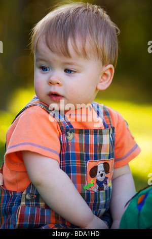 Portrait of a toddler playing in the garden Stock Photo