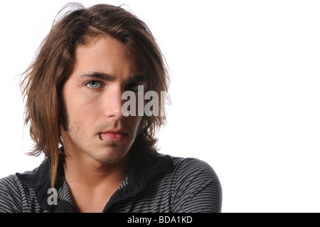 Portrait of young man with piercing on lip Stock Photo