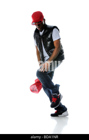 African American man dancing hip hop style isolated over white Stock Photo