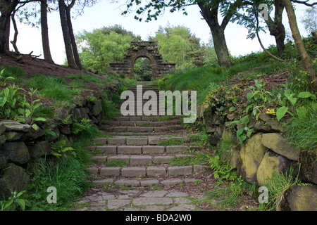 Steps leading to arch in in Rivington terraced gardens Lancashire UK Stock Photo