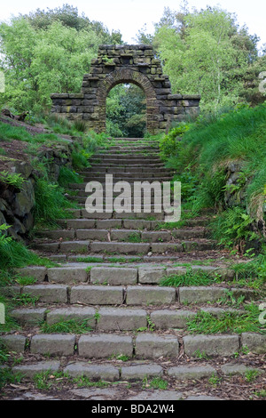 Steps leading to arch in in Rivington terraced gardens Lancashire UK Stock Photo