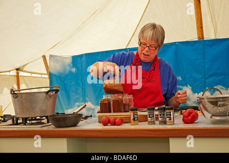 A pickling demonstration by Rosemary Moon at the Chilli Fiesta, West Dean Gardens, West Sussex, England, UK. Stock Photo
