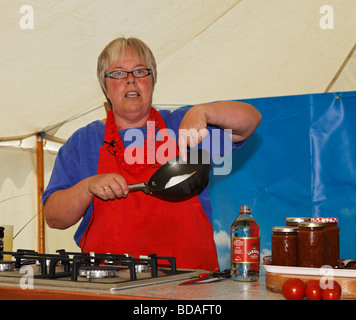 A pickling demonstration by Rosemary Moon at the Chilli Fiesta, West Dean Gardens, West Sussex, England, UK. Stock Photo