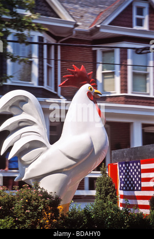 Large bird on small town parade float. Stock Photo