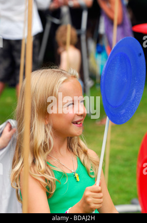 Youngster having a go at plate spinning at Chawton Village Fete, Chawton, Hampshire UK. 08.08.2009. Stock Photo