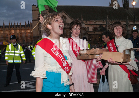 Climate Rush protest on 100th anniversary of Suffragette rush. Tamsin Omond at the start of the rush on Parliament Stock Photo