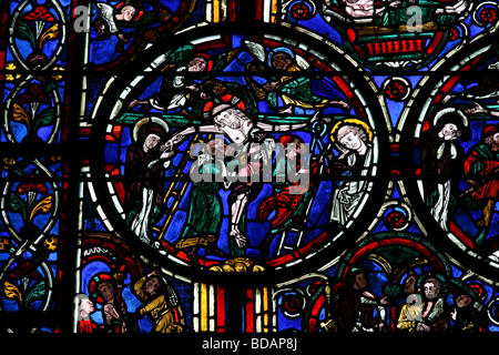 Stained glass window depicting the deposition of Christ from the Cross with help from Nicodemus and Joseph of Arimathea. Stock Photo