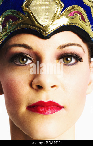 Portrait of a young woman wearing headdress Stock Photo