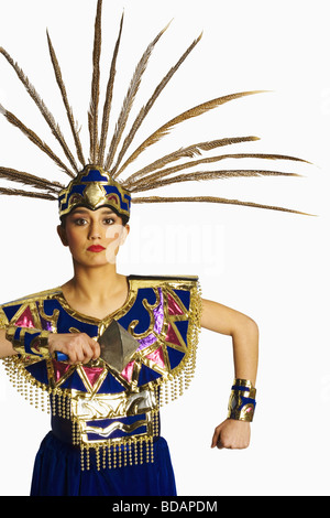 Portrait of an Aztec dancer wearing stage costume and performing Stock Photo