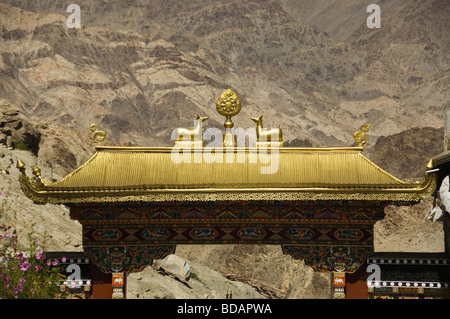 Religious symbols at the top of entrance gate of monastery, Thiksey Monastery, Ladakh, Jammu and Kashmir, India Stock Photo