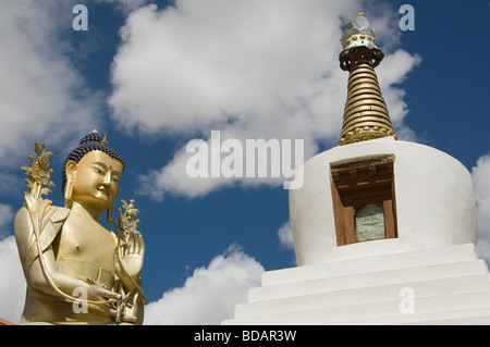 Low angle view of statue of Buddha near a chorten, Likir Monastery, Ladakh, Jammu and Kashmir, India Stock Photo