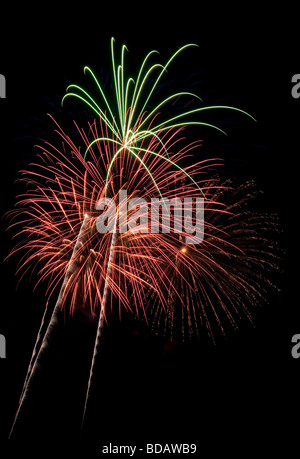 Beautiful fireworks fill the night time sky Stock Photo