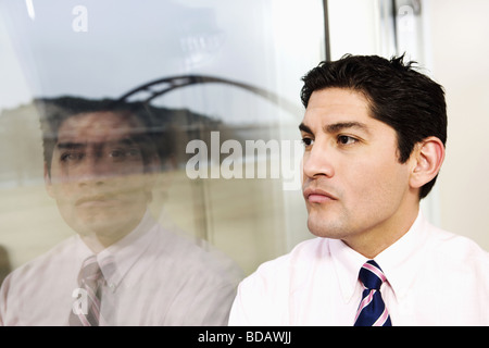 Close-up of a businessman thinking and looking away Stock Photo