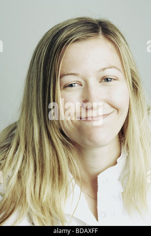 Portrait of a young woman making a face Stock Photo