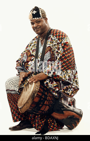 Portrait of a mature man playing a drum Stock Photo