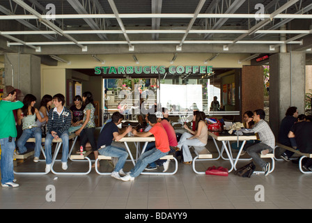 A Starbuck s cafe on campus is a favorite place between classes at the University of Monterrey, Nuevo Leon, Mexico. Stock Photo