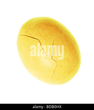 cracked speckled egg isolated on a white background Stock Photo