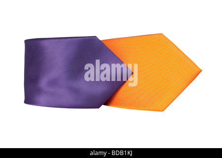 Violet and orange rolled up neck ties isolated over white background. Stock Photo