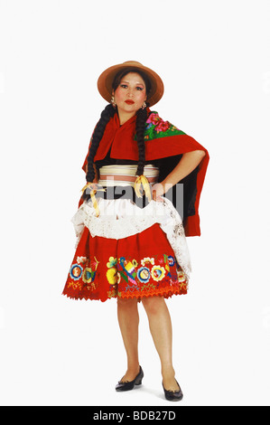 Portrait of a young woman standing with her hand on her hip Stock Photo