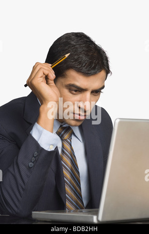 Businessman using a laptop Stock Photo