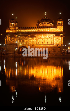 Temple lit up at night, Golden Temple, Amritsar, Punjab, India Stock Photo