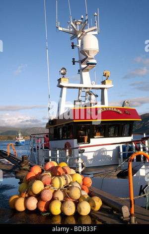 Scottish fishing boat in harbour: SEEMATZ FURUNO Ships Equipment Ullapool Stock Photo