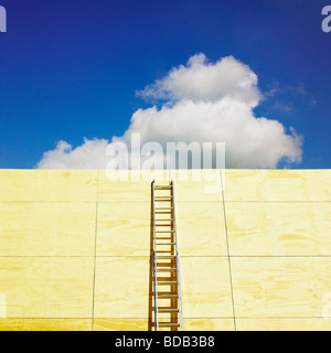 Ladder and blue sky. Stock Photo